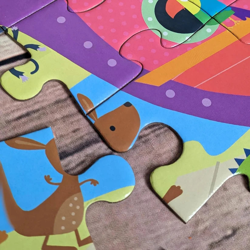 1: Completed Noah's Ark 50-piece kids jigsaw puzzle showing ark, rainbow and animals
2: Close-up of large chunky jigsaw pieces with kangaroo from Noah's Ark puzzle
3: Noah's Ark children's jigsaw box with puzzle pieces spread on table
4: Noah's Ark 50 piece Bible jigsaw puzzle box for kids ages 3 and up