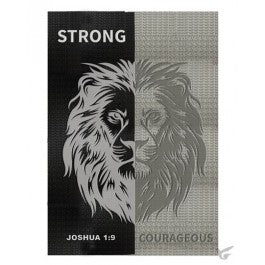 Black and grey Christian journal with lion face, "Strong" and "Courageous" and Joshua 1:9 on the cover